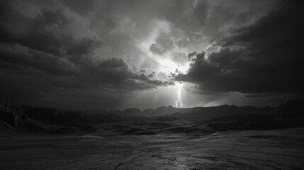 Dramatic Black and White Landscape with Lightning Strike over Mountain Range.