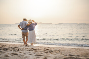 Seniors go on vacation at the beach. Seniors plan for retirement with insurance. Seniors are retired.