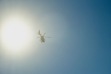 Helicopter Flying Over the North Sea During Bright Sunny Day, Showing Coastal Exploration and Aerial Activities