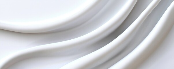 Obraz premium A smooth, flowing white surface with gentle curves, evoking a sense of calm and elegance.