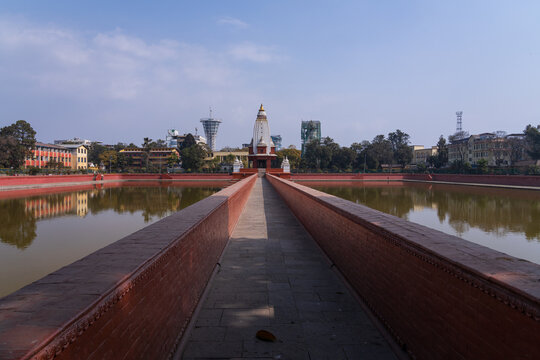 Rani Pokhari, a historic artificial pond in Kathmandu, Nepal, was built in 1670 by King Pratap Malla. It symbolizes love and is a significant cultural landmark.