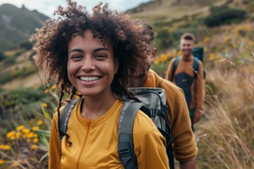 Portrait of a satisfied mixed race couple in their 20s going on a hike in nature