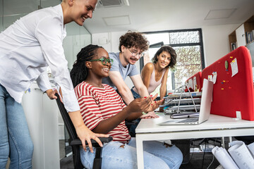 Obraz premium In a student support center at the creative office, a group of students of varied backgrounds gather to advance causes like human rights, race equality and students support. 