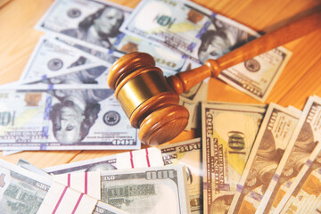 Judge gavel and money.