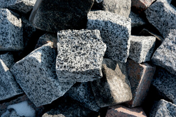 Unique textures of granite stones captured in natural light outdoors