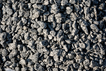 Textured stones create a natural landscape in gray tones