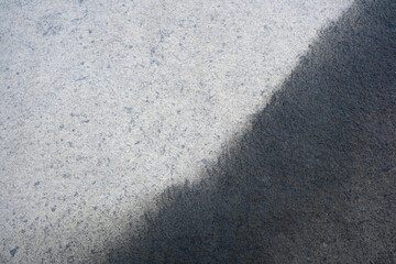 Fototapeta premium Exploration of contrasting textures and shades in timeless stone