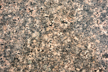 Textured granite surface showcases natural beauty in varied tones
