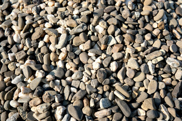 Natural stones create a textured and colorful ground covering