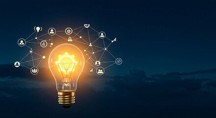 A network of connections illuminates the lightbulb, with its glowing gear, symbolizing creative inspiration