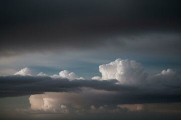Obraz premium Dramatic sky with storm clouds before rain. Panoramic view of the stormy sky and dark clouds. Concept on the theme of weather, natural disasters, typhoon.