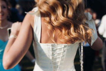 High school graduates dancing on prom, waltz and classical ball slow dance in dresses and suits on...