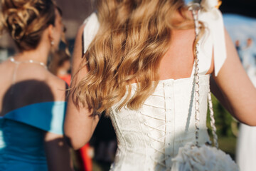 High school graduates dancing on prom, waltz and classical ball slow dance in dresses and suits on school graduation party, boys and girls ballroom dancers, couples dance quadrille and polonaise © tsuguliev