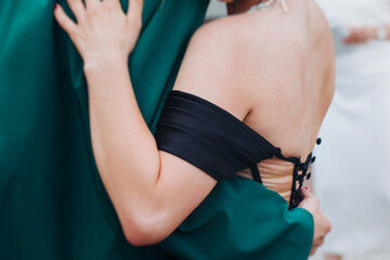 High school graduates dancing on prom, waltz and classical ball slow dance in dresses and suits on...