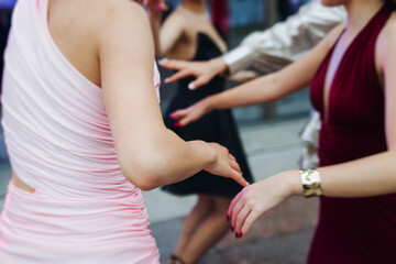 High school graduates dancing on prom, waltz and classical ball slow dance in dresses and suits on...