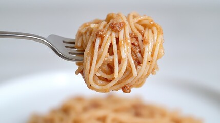 Forkful of spaghetti bolognese, close-up, plate, delicious
