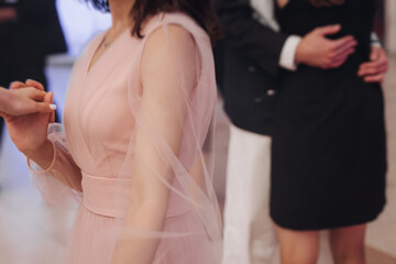High school graduates dancing on prom, waltz and classical ball slow dance in dresses and suits on...