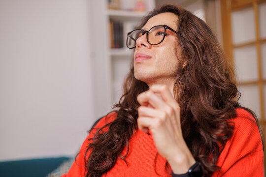 faces of non-binary people with thoughtful and positive expressions