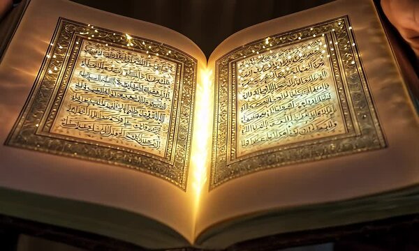 A glowing open Quran held by hands, symbolizing spirituality and enlightenment.