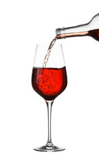 Pouring wine into glass on white background