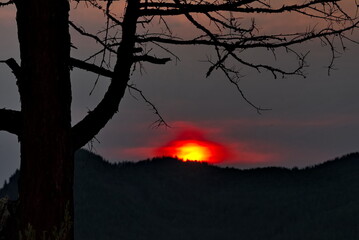 Russia. The Republic of Buryatia. August 20, 2024. Picturesque sunset sky over the Sayan Mountains in the valley of the river Tissa.