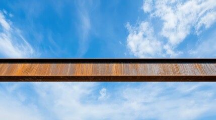 Fototapeta premium Rusty Metal Beam Against Cloudy Sky