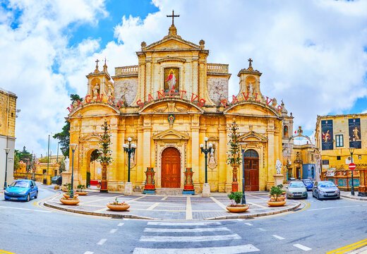 San Pawl Square with medieval Collegiate church of St Paul with garlands and lanterns to the Feast of St Peter and St Paul, on June 16 in Rabat, Malta
