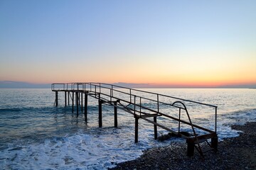 Fototapeta premium Sea sunset pier. High quality photo