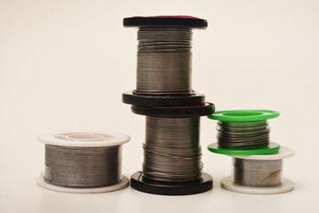 Coils with solder. Solder for electronics. Tin-lead solder.