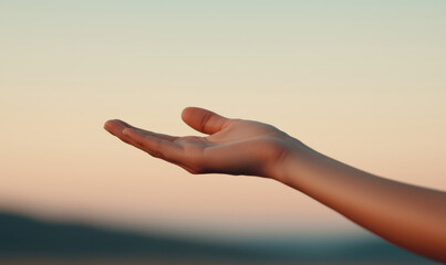 Capture the Essence of Connection: A Hand Reaching Towards the Horizon at Sunset Embracing Peace and Serenity in Nature's Embrace