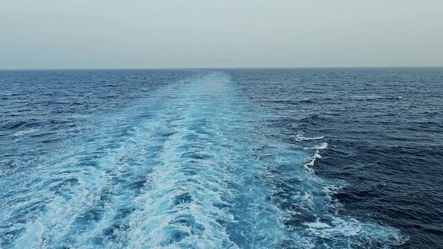 Ship wake-Blue ocean-Vanishing point to horizon