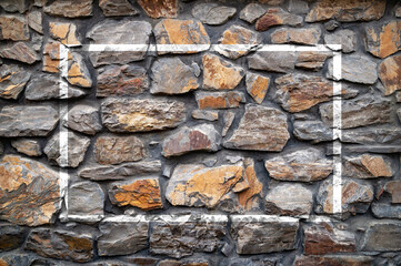 Stone wall. Wall of hewn wild stone. Stone background.