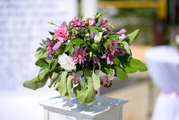 Wedding floral arrangement with wildflowers and greenery