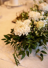 Fresh white floral centerpiece on wedding table