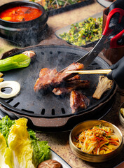 korean grilled meat with vegetables and cut