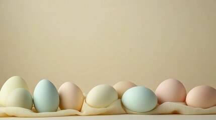 Colorful eggs arranged in a soft cloth tray against a simple background in a tranquil setting