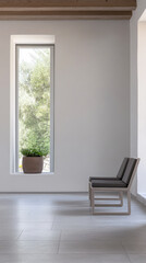 Fototapeta premium Modern minimalist interior featuring a chair and large window with greenery