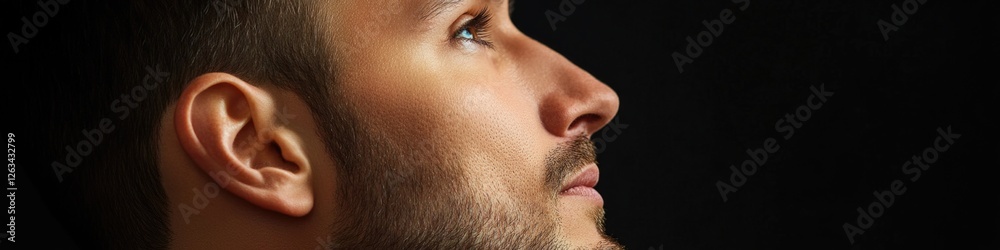 Poster close-up portrait of a person with a beard, ideal for representing wisdom or authority