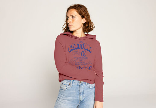 Young Woman in a Cozy Sweater Poses Casually for a Portrait. PSD mockup ready to insert your design and change the color