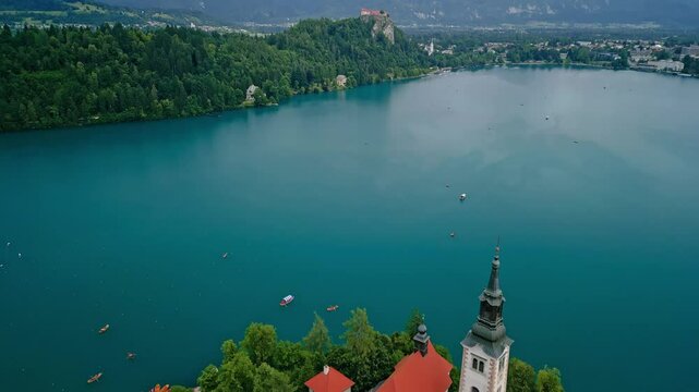 Lake Bled is famous as one of the most romantic places in Europe, perfect for a honeymoon or wedding. This image can be used in the context of romantic getaways, wedding tourism and luxury holidays.