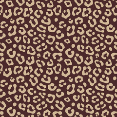 Leopard print seamless pattern with brown and beige colors, featuring irregular spots and shapes, perfect for fashion, textile, and design projects