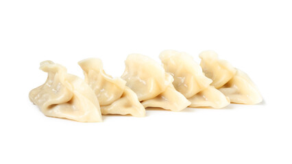 Tasty boiled gyoza (dumplings) isolated on white