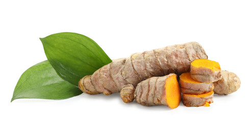 Tumeric rhizomes with leaves isolated on white