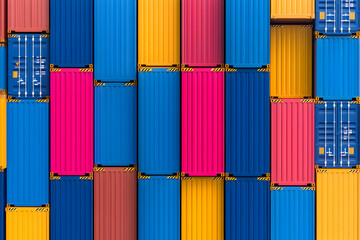 Colorful shipping containers stacked, ideal for cargo transport, global trade background. Generative AI