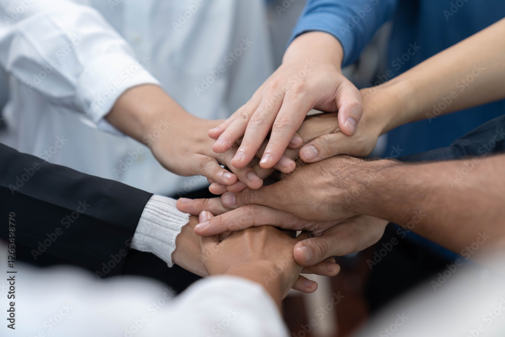 Aufkleber group of diverse office worker join hand together in office room symbolize business synergy and stro