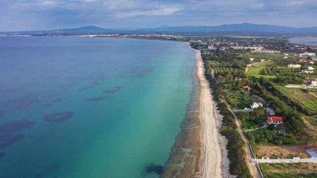 Aerial view at Nea Potidea canal, which connects Toroneos Bay with the Gulf of Thermaikos. Greece, Kassandra, Halkidiki