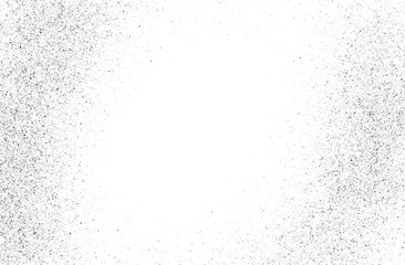 Black Ink Splash with Grunge Effect and Fine Details on a Light Surface