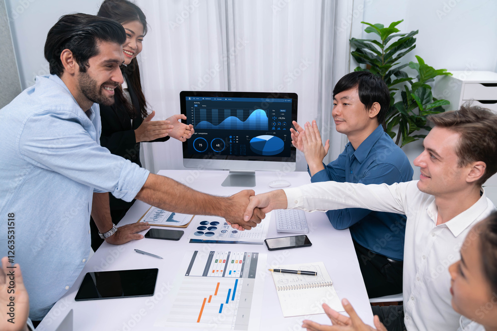 Aufkleber Analyst team leader shake hand with his colleague after successful data analysis meeting using FIntech software power with business intelligence or BI dashboard. Prudent