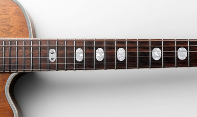 Close-Up View of Acoustic Guitar Fretboard with Six Frets Visible and Pearl Inlays on a Light Background