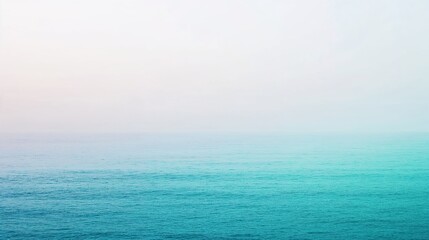 Obraz premium Calm ocean view with soft gradient colors and minimalistic horizon